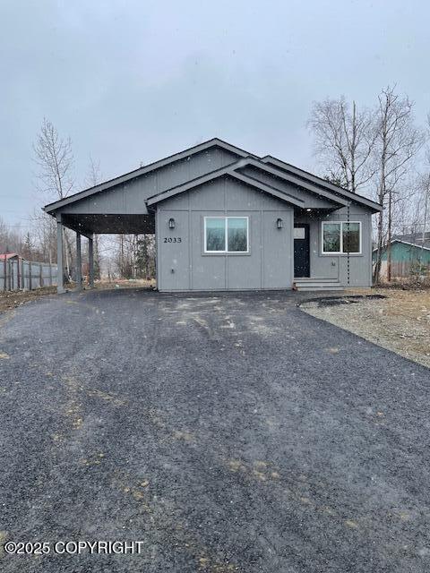 2033 E Chickaloon Rd, Wasilla, AK 99654 - view of front of home with asphalt driveway and an attached carport