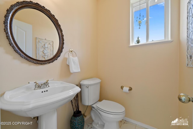 10100 Zermatt Cir, Anchorage, AK 99507 - bathroom with toilet and tile patterned flooring