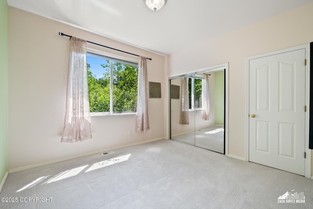 10100 Zermatt Cir, Anchorage, AK 99507 - unfurnished bedroom with carpet floors and a closet