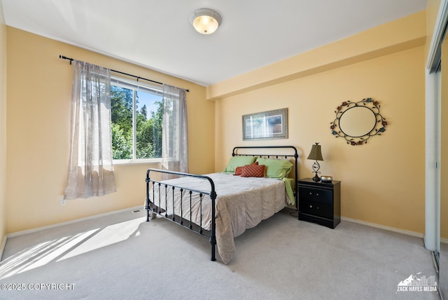 10100 Zermatt Cir, Anchorage, AK 99507 - carpeted bedroom featuring baseboards