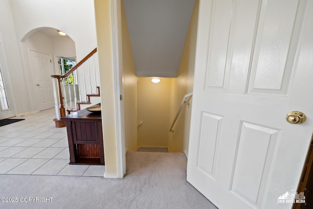 10100 Zermatt Cir, Anchorage, AK 99507 - stairway with arched walkways and carpet