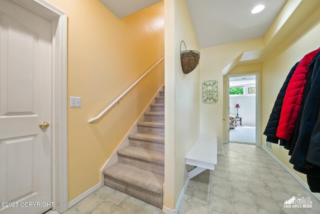10100 Zermatt Cir, Anchorage, AK 99507 - staircase with baseboards and tile patterned flooring