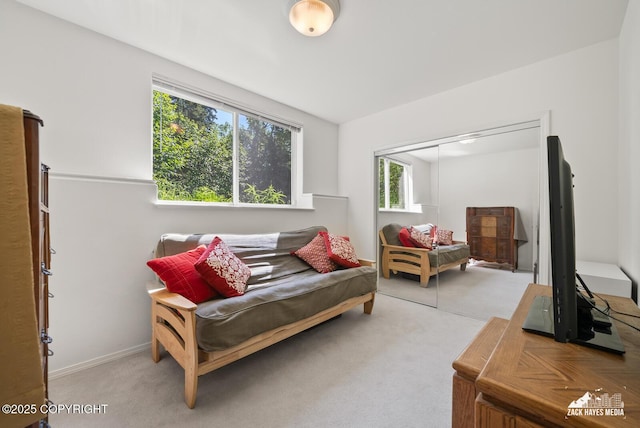 10100 Zermatt Cir, Anchorage, AK 99507 - living room featuring healthy amount of natural light and carpet flooring