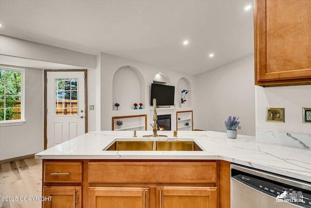 11510 Tulin Park Loop, Anchorage, AK 99516 - kitchen with stainless steel dishwasher, wood finished floors, open floor plan, light stone counters, and recessed lighting