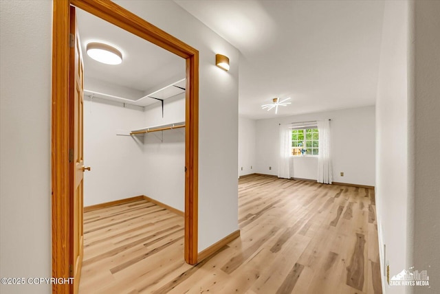 11510 Tulin Park Loop, Anchorage, AK 99516 - walk in closet with light wood-style flooring