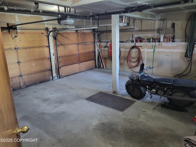 9921 Nearpoint Dr, Anchorage, AK 99507 - garage with a garage door opener