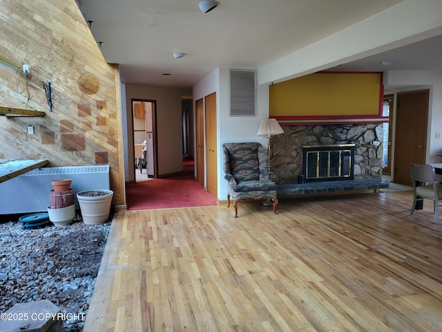 9921 Nearpoint Dr, Anchorage, AK 99507 - living area with wood finished floors and a fireplace
