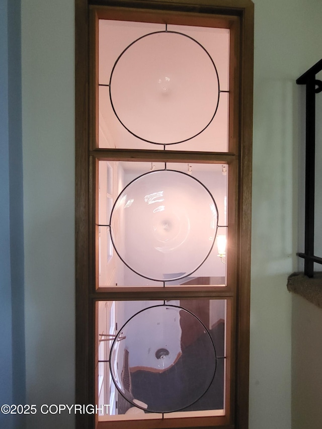 9921 Nearpoint Dr, Anchorage, AK 99507 - detailed view of stacked washer and clothes dryer