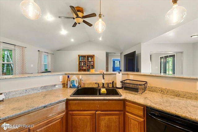 1708 Wesbet Ct, Kenai, AK 99611 - kitchen with black dishwasher, a ceiling fan, brown cabinetry, lofted ceiling, and light stone countertops