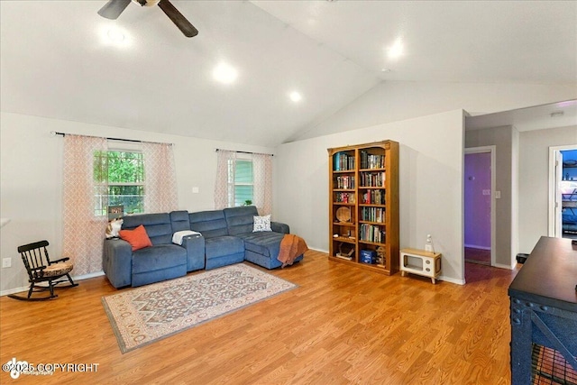1708 Wesbet Ct, Kenai, AK 99611 - living area with vaulted ceiling, ceiling fan, and wood finished floors