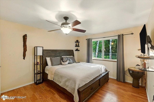 1708 Wesbet Ct, Kenai, AK 99611 - bedroom with wood finished floors and a ceiling fan