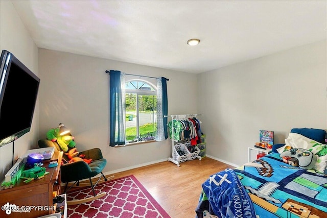 1708 Wesbet Ct, Kenai, AK 99611 - bedroom with wood finished floors and baseboards