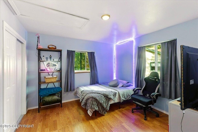 1708 Wesbet Ct, Kenai, AK 99611 - bedroom with attic access and wood finished floors