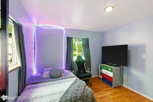 1708 Wesbet Ct, Kenai, AK 99611 - bedroom featuring wood finished floors and baseboards
