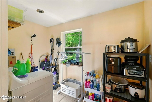 1708 Wesbet Ct, Kenai, AK 99611 - misc room featuring tile patterned flooring and washer / dryer