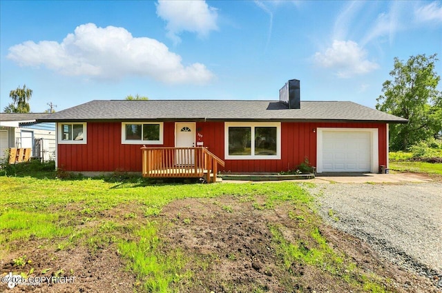 309 Stewart St, Anchorage, AK 99508 - single story home featuring gravel driveway, a chimney, and board and batten siding