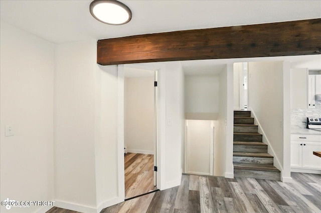 309 Stewart St, Anchorage, AK 99508 - below grade area featuring wood finished floors and stairs