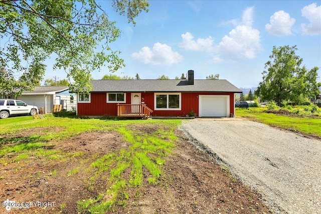 309 Stewart St, Anchorage, AK 99508 - ranch-style home with a garage, driveway, a chimney, and a front lawn