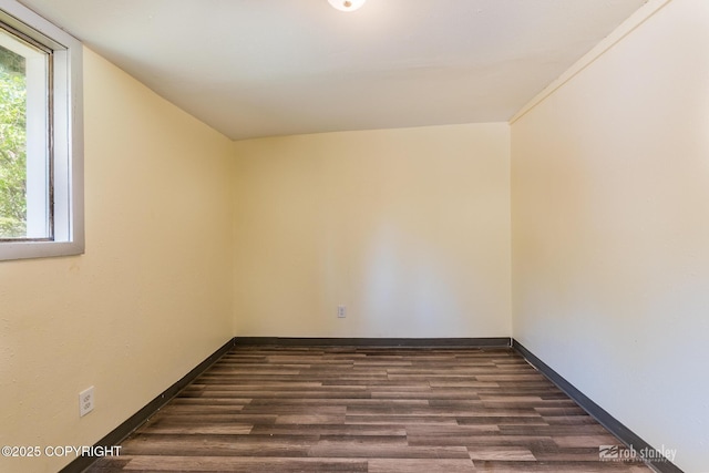 3521 N Caribou St, Wasilla, AK 99654 - spare room with plenty of natural light and dark wood-style floors