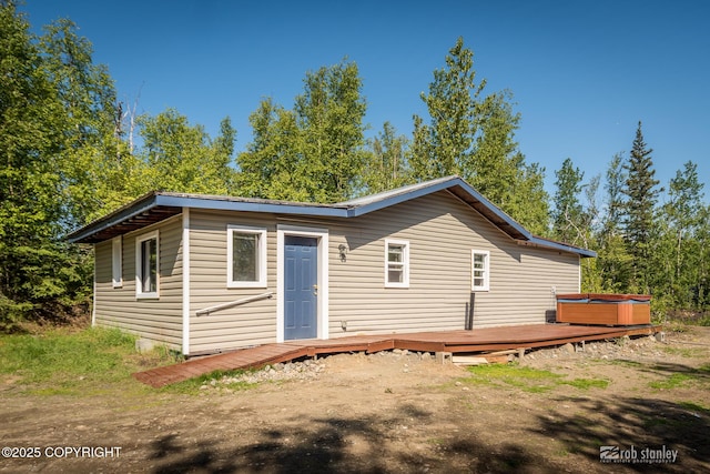 3521 N Caribou St, Wasilla, AK 99654 - view of front of property featuring a hot tub and a deck