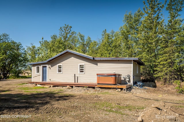 3521 N Caribou St, Wasilla, AK 99654 - rear view of property featuring a wooden deck