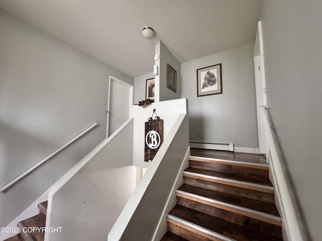 544 N Park St, Anchorage, AK 99508 - staircase with a baseboard heating unit