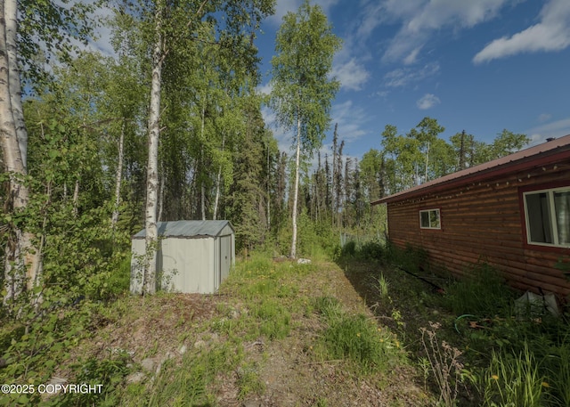 1245 N Miller Cir, Houston, AK 99623 - view of yard with a storage unit