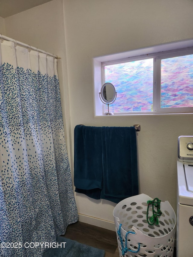 1245 N Miller Cir, Houston, AK 99623 - full bathroom with washer / clothes dryer, wood finished floors, and a shower with curtain