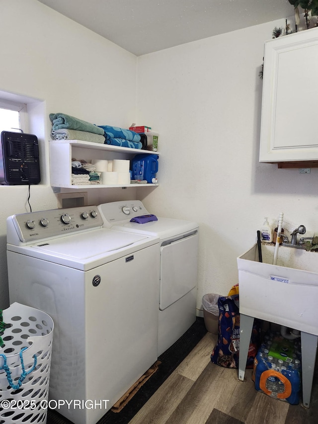 1245 N Miller Cir, Houston, AK 99623 - laundry room with washer and clothes dryer, cabinet space, and wood finished floors