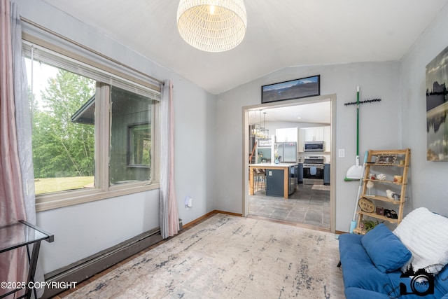 3501 N Calder Rd, Wasilla, AK 99654 - living area with a chandelier, vaulted ceiling, and light stone finish floors