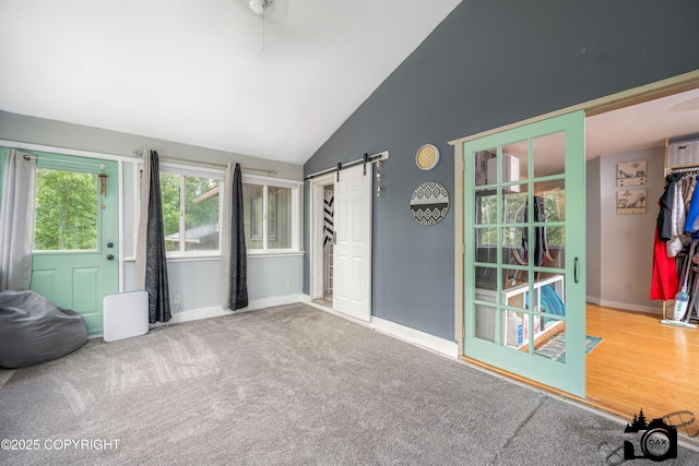 3501 N Calder Rd, Wasilla, AK 99654 - sunroom / solarium with lofted ceiling and a barn door
