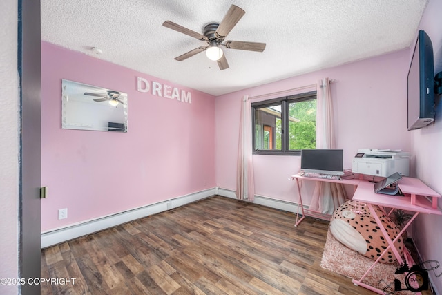3501 N Calder Rd, Wasilla, AK 99654 - office featuring a ceiling fan, a textured ceiling, wood finished floors, and a baseboard radiator