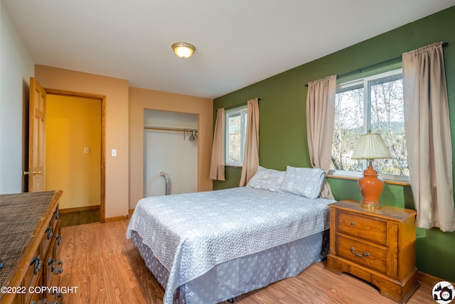 12230 Nautical Ave, Seward, AK 99664 - bedroom featuring a closet and wood finished floors