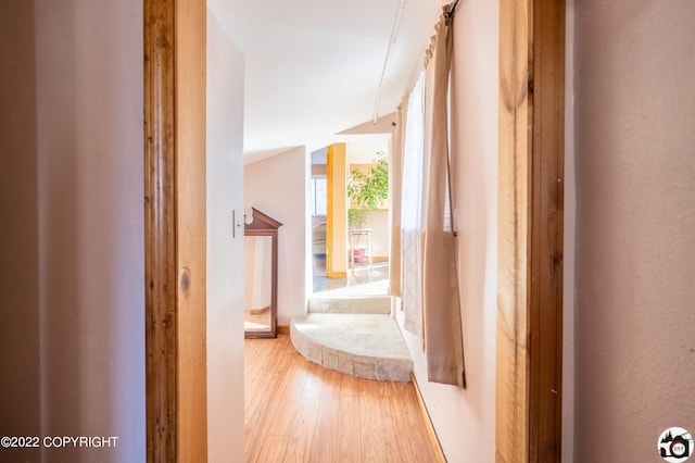 12230 Nautical Ave, Seward, AK 99664 - hall with light wood-style flooring and vaulted ceiling