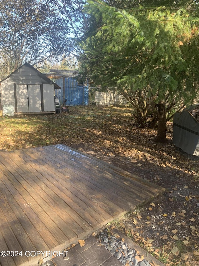 12230 Nautical Ave, Seward, AK 99664 - wooden deck featuring a shed