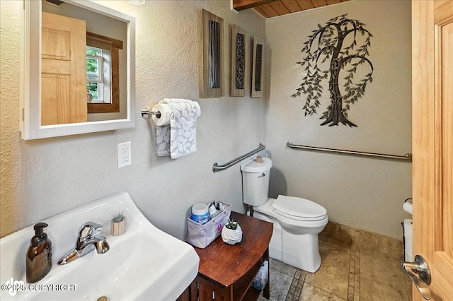 5968 Kenai Spur Highway, Kenai, AK 99611 - half bathroom featuring a textured wall