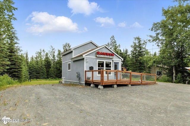5968 Kenai Spur Highway, Kenai, AK 99611 - view of front facade with a wooden deck