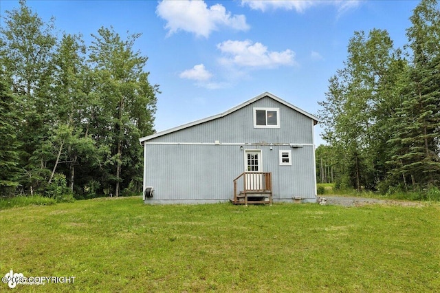 5968 Kenai Spur Highway, Kenai, AK 99611 - rear view of property featuring a yard