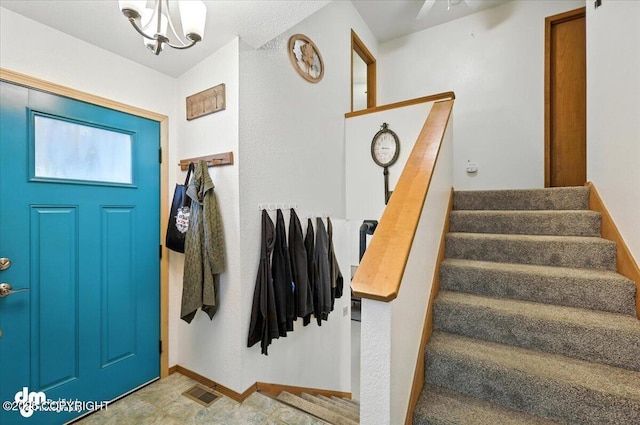 3800 E Birch View Dr, Wasilla, AK 99654 - foyer entrance featuring stairs and a chandelier