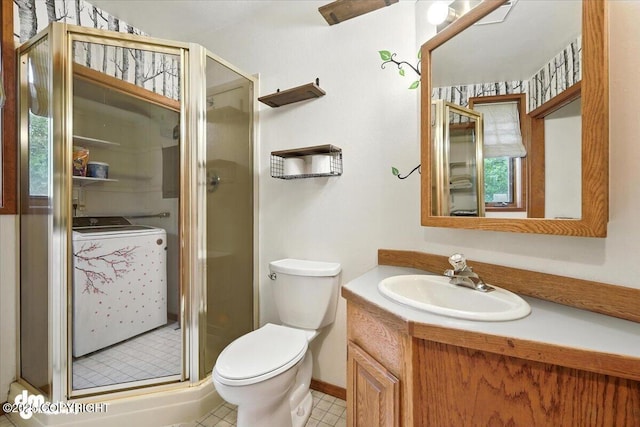 3800 E Birch View Dr, Wasilla, AK 99654 - bathroom featuring washer / dryer, vanity, and a shower stall