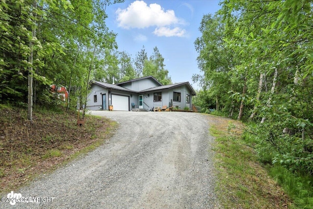 3800 E Birch View Dr, Wasilla, AK 99654 - ranch-style house with dirt driveway and an attached garage