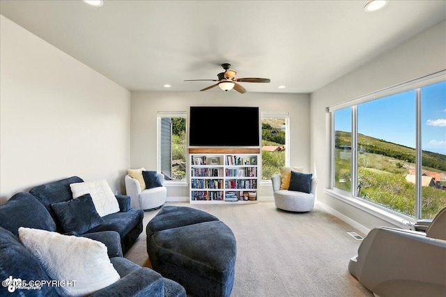 10380 Honey Bear Ln, Anchorage, AK 99516 - living area with carpet flooring, recessed lighting, and a ceiling fan