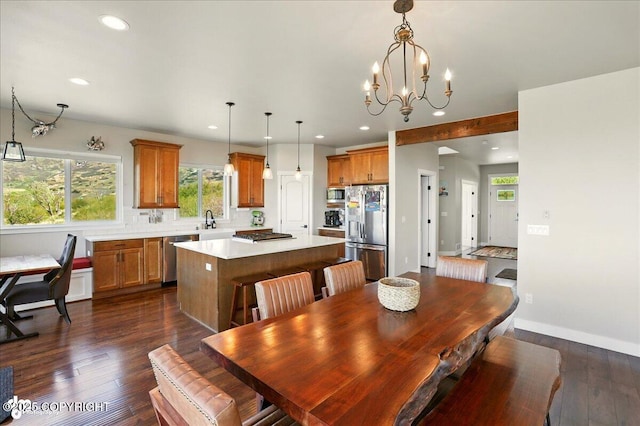 10380 Honey Bear Ln, Anchorage, AK 99516 - dining area featuring recessed lighting, dark wood-style floors, and a chandelier