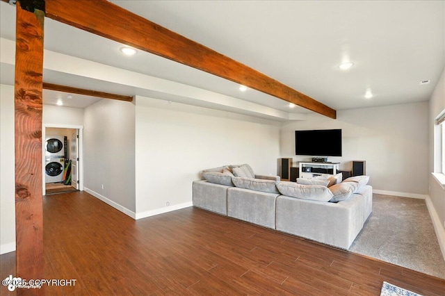 10380 Honey Bear Ln, Anchorage, AK 99516 - living area with stacked washing machine and dryer, beam ceiling, recessed lighting, and wood finished floors