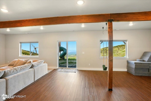 10380 Honey Bear Ln, Anchorage, AK 99516 - living area with beam ceiling, wood finished floors, healthy amount of natural light, and recessed lighting