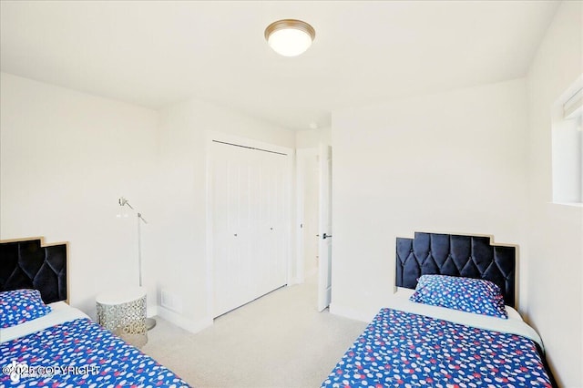 10380 Honey Bear Ln, Anchorage, AK 99516 - bedroom with carpet flooring and a closet