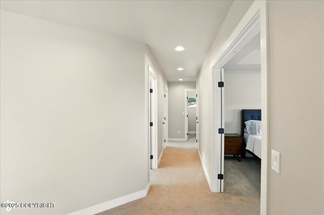 10380 Honey Bear Ln, Anchorage, AK 99516 - corridor featuring light colored carpet and recessed lighting