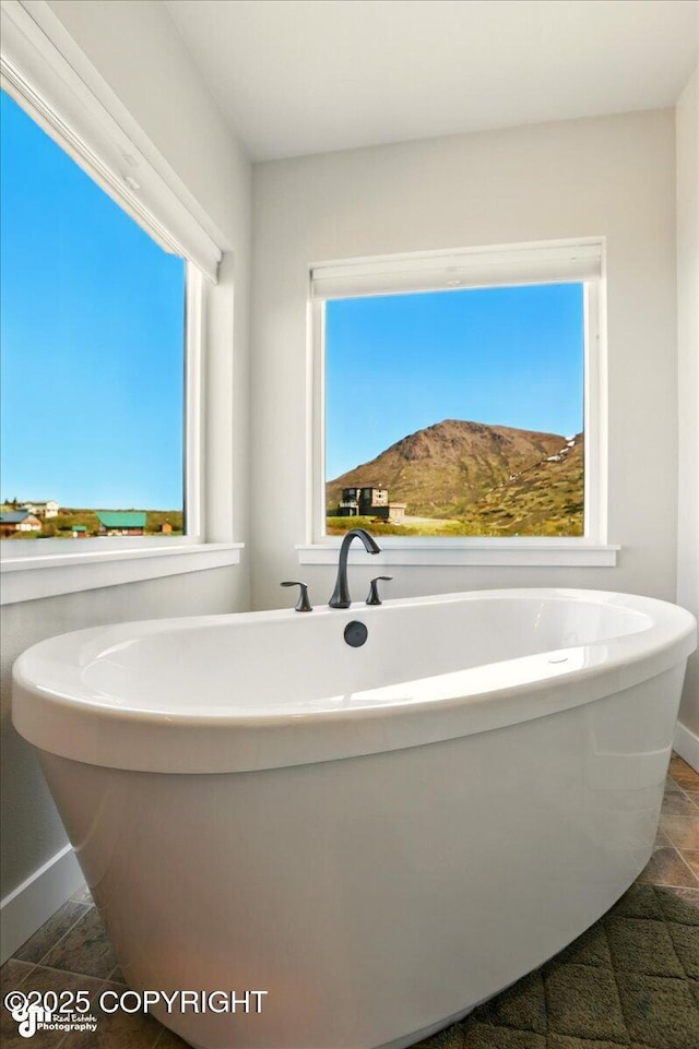 10380 Honey Bear Ln, Anchorage, AK 99516 - full bathroom featuring a freestanding bath