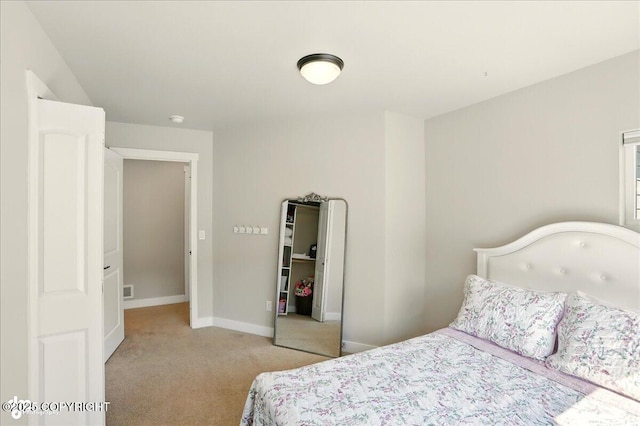 10380 Honey Bear Ln, Anchorage, AK 99516 - bedroom with light carpet and baseboards