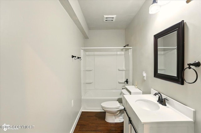 10380 Honey Bear Ln, Anchorage, AK 99516 - bathroom featuring vanity, wood finished floors, and shower / tub combination
